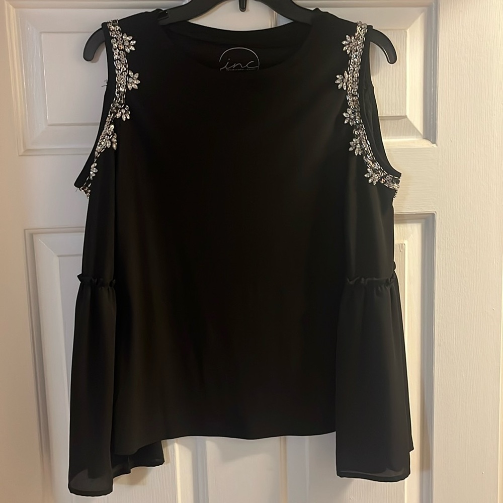 Cold shoulder black top, laced with bling!